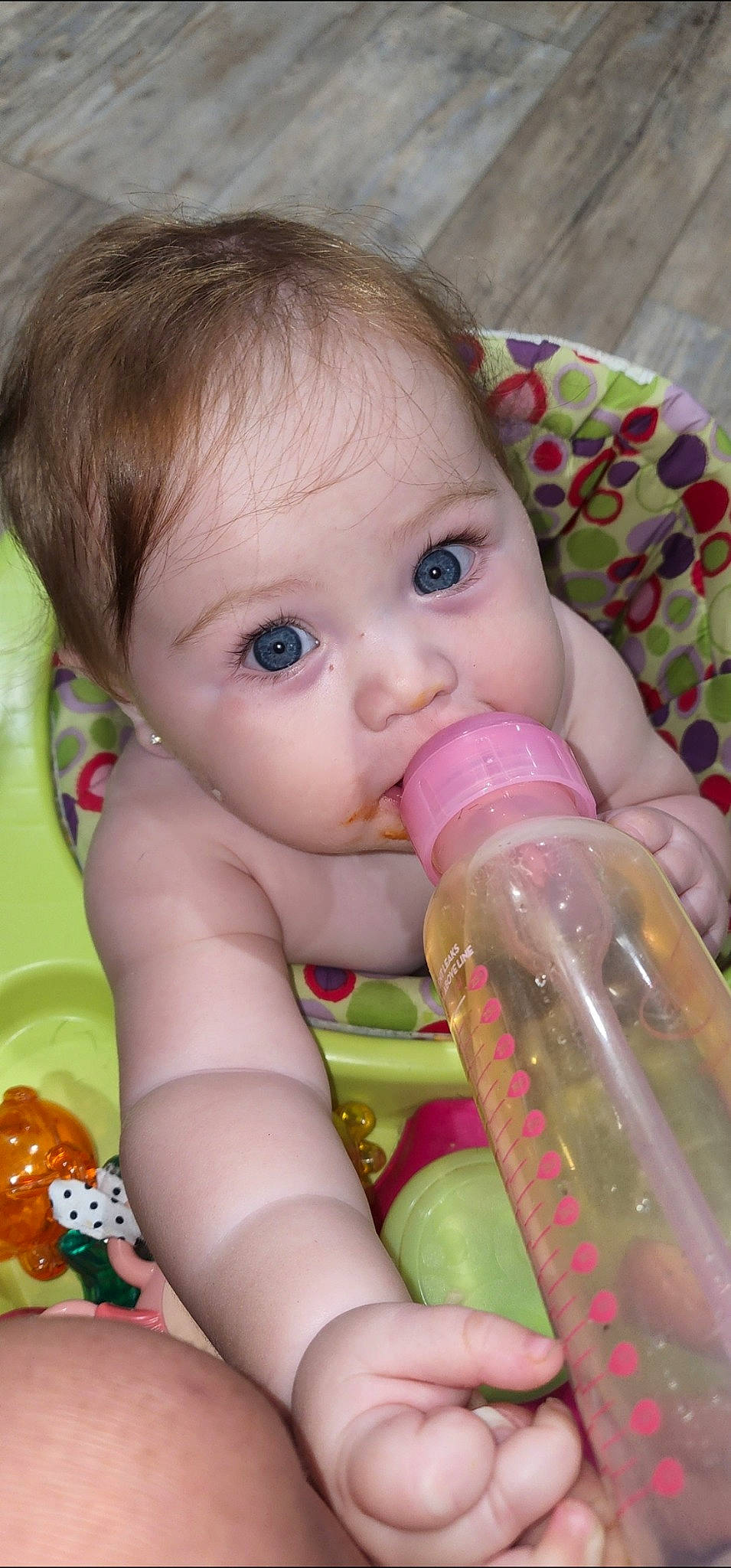 Georgia joined the competition — help win amazing prizes! baby, baby_bottle, baby_grabbing_for_something, baby_playing_with_toys, bottle, cheek, drinkware, eyelash, facial_expression, finger, happy, iris, lip, mouth, nose, person, pink, plastic_bottle, product, skin