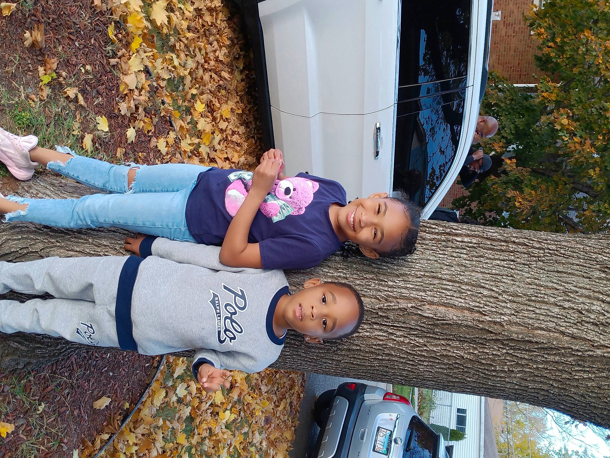 Amina joined the competition — help win amazing prizes! car, child, denim, electric_blue, fun, grass, human_leg, joy, knee, leisure, person, recreation, sitting, sunglasses, t_shirt, thigh, toddler, travel, tree, vacation