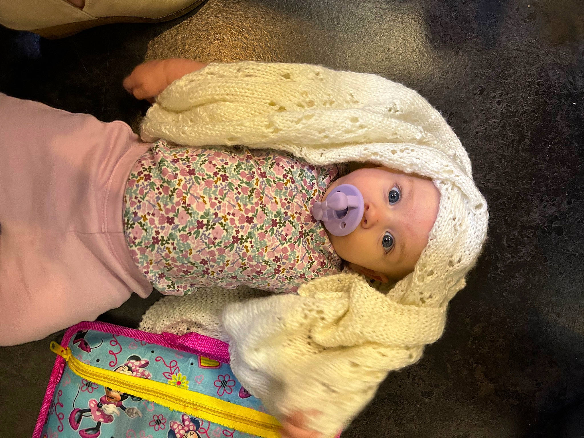 Adaline is registered to the contest to win money with this photo: arm, art, baby, baby_products, baby_sleeping, baby_toddler_clothing, cap, cheek, comfort, eye, fashion_accessory, headwear, human_body, knit_cap, linens, person, skin, sleeve, textile, toddler