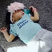 Autumn joined the competition — help win amazing prizes! baby, child, infant, lying_down, carpet, flower_headband, blue_shirt, little_sister, bottle, drinking, sunlight, indoor, portrait, casual, fashion, bracelet, gray_pants, smiling, family, cute