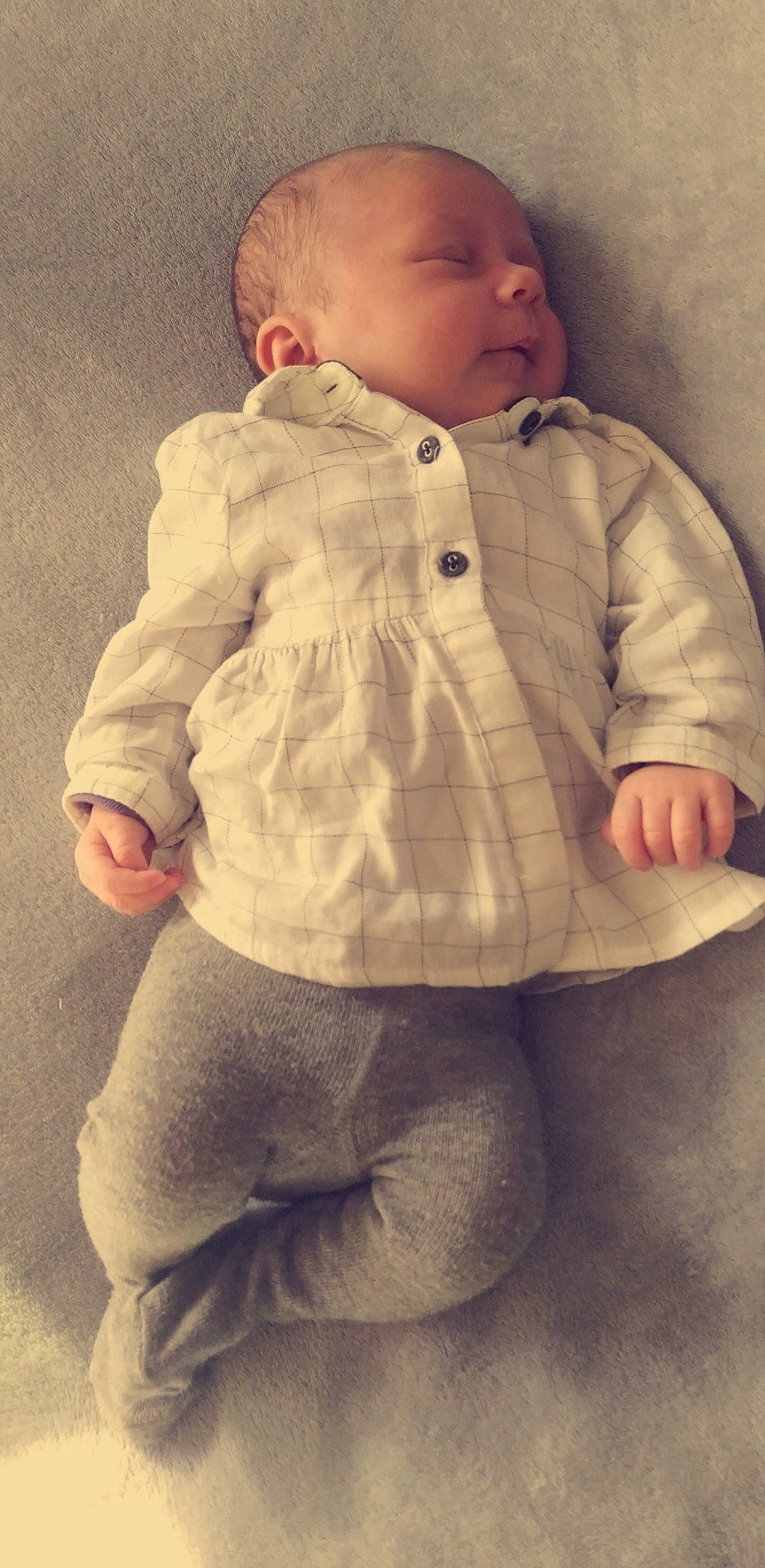 Shana participe au concours pour gagner de l'argent avec cette photo : baby, baby_toddler_clothing, cheek, chin, collar, comfort, face, finger, gesture, head, human_body, jacket, lip, neck, nose, outerwear, person, skin, sleeve, toddler