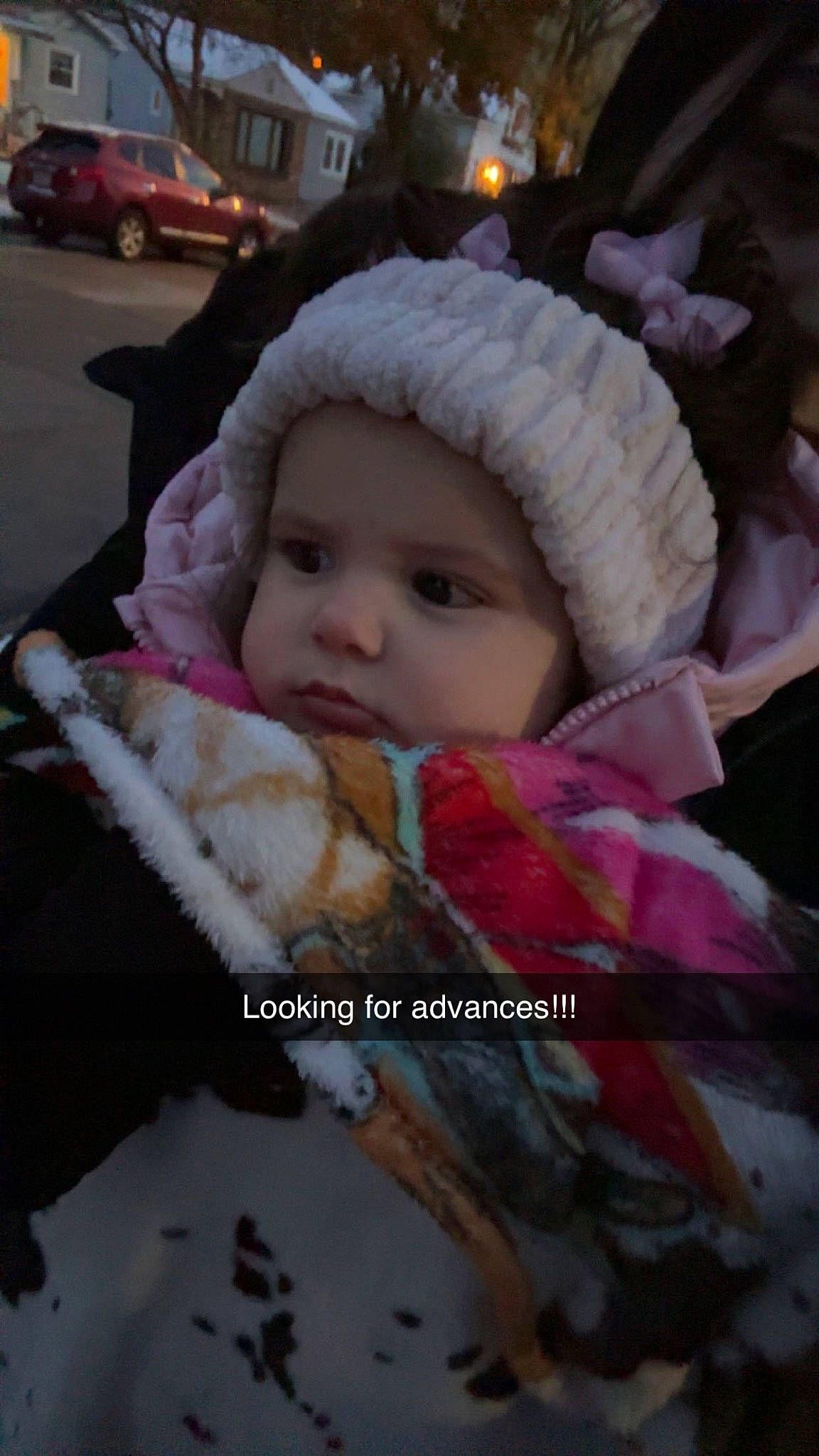 Nina is registered to the contest to win money with this photo: baby, beanie, cap, child, companion_dog, event, family_car, fur, fur_clothing, happy, headwear, knit_cap, luxury_vehicle, person, photo_caption, pink, stuffed_toy, tire, toddler, wheel