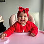 baby, child, high_chair, red_headband, red_sweater, smiling, toothy_grin, indoor, pink_high_chair, cute, happy, portrait, person, headwear, infant, clothing, furniture, baby_girl, sitting, cheerful