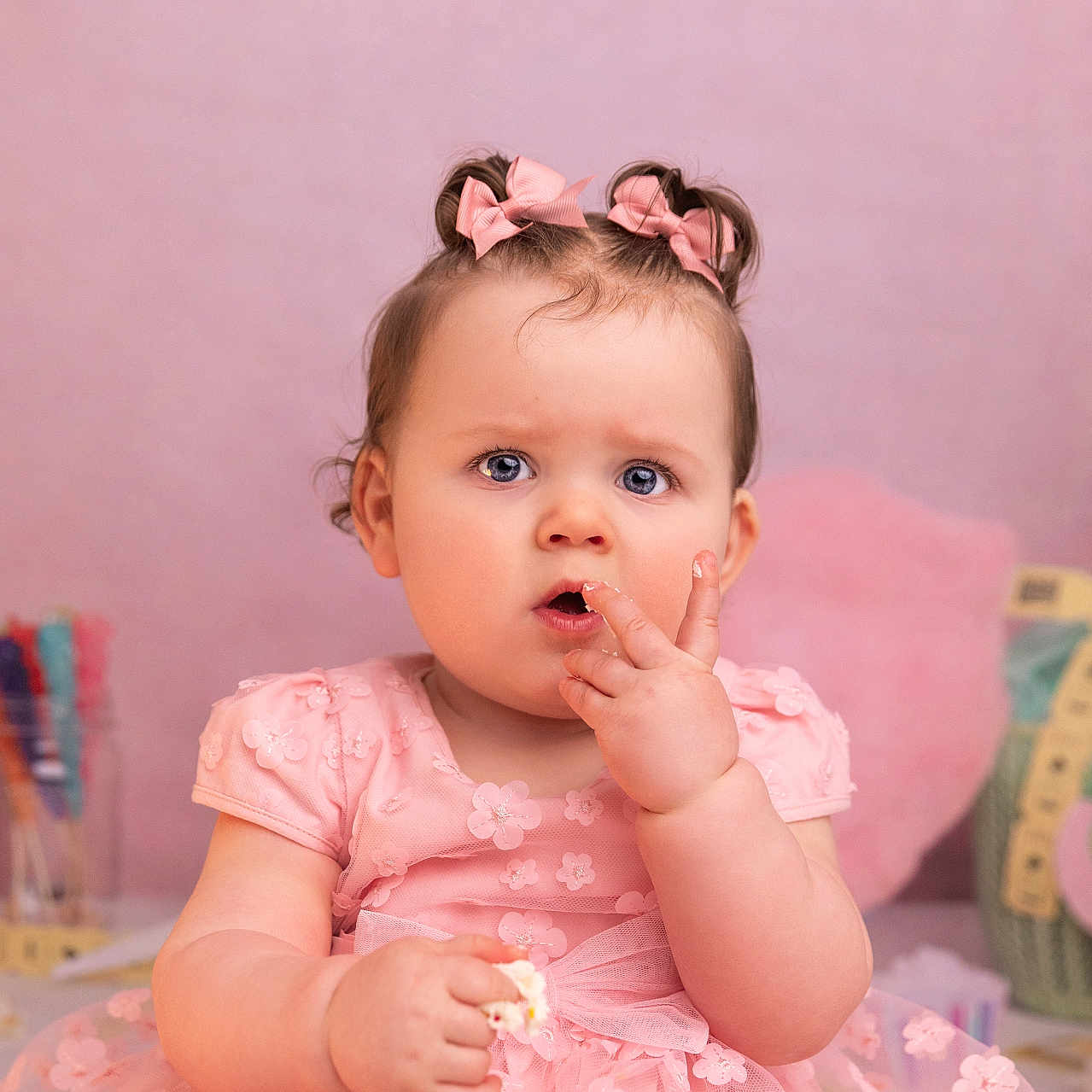 Isla Grace joined the competition — help win amazing prizes! accessories, baby, bodypart, clothing, cream, dessert, dress, eating, face, finger, food, hand, head, icing, mouth, person, photography, portrait, sitting, sweets