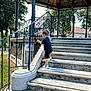 Xuann participe au concours pour gagner de l'argent avec cette photo : toddler, child, stairs, outdoor, daylight, railing, sneakers, shorts, tshirt, gazebo, trees, park, stone, steps, handrail, summer, playground, nature, walking, curious