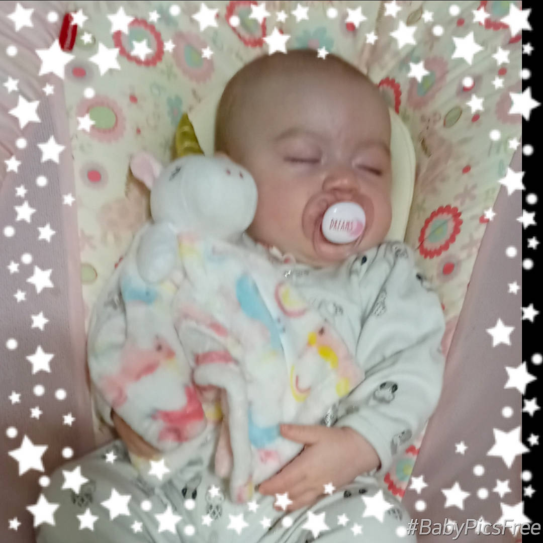 Amelia is registered to the contest to win money with this photo: baby, baby_products, baby_sleeping, baby_toddler_clothing, bedtime, cheek, child, comfort, face, happy, iris, linens, pattern, person, pink, room, skin, sleep, sleeve, textile