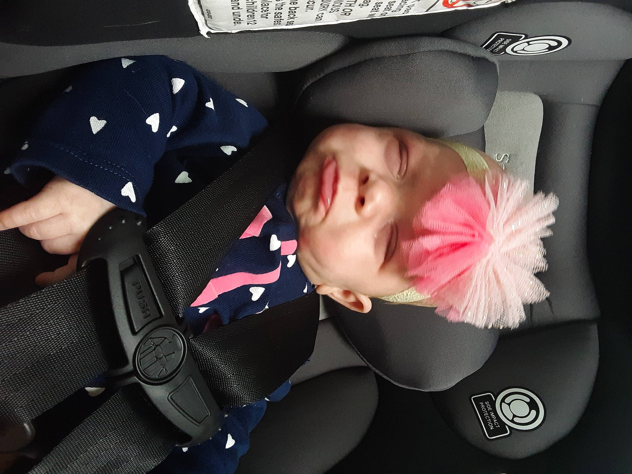 Madalyn is registered to the contest to win money with this photo: auto_part, automotive_design, baby, baby_carriage, baby_in_car_seat, baby_products, car_seat, car_seat_cover, child, comfort, family_car, fashion_accessory, finger, head_restraint, headwear, luxury_vehicle, person, personal_luxury_car, sitting, steering_wheel