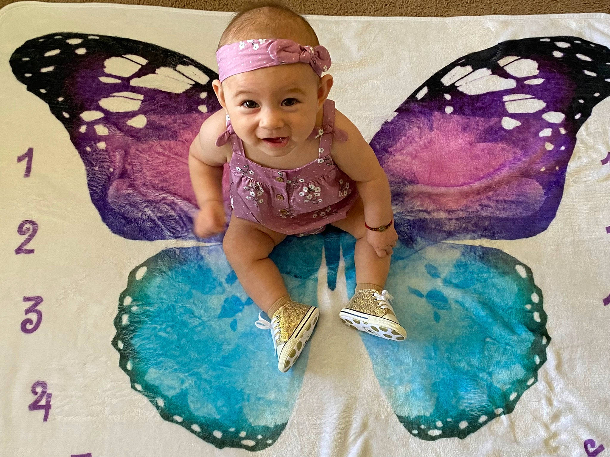 Alaiyah joined the competition — help win amazing prizes! art, arthropod, baby_toddler_clothing, beauty, butterfly, electric_blue, fashion_accessory, happy, insect, magenta, moths_and_butterflies, organism, paint, person, photograph, pink, pollinator, smile, symmetry, toddler