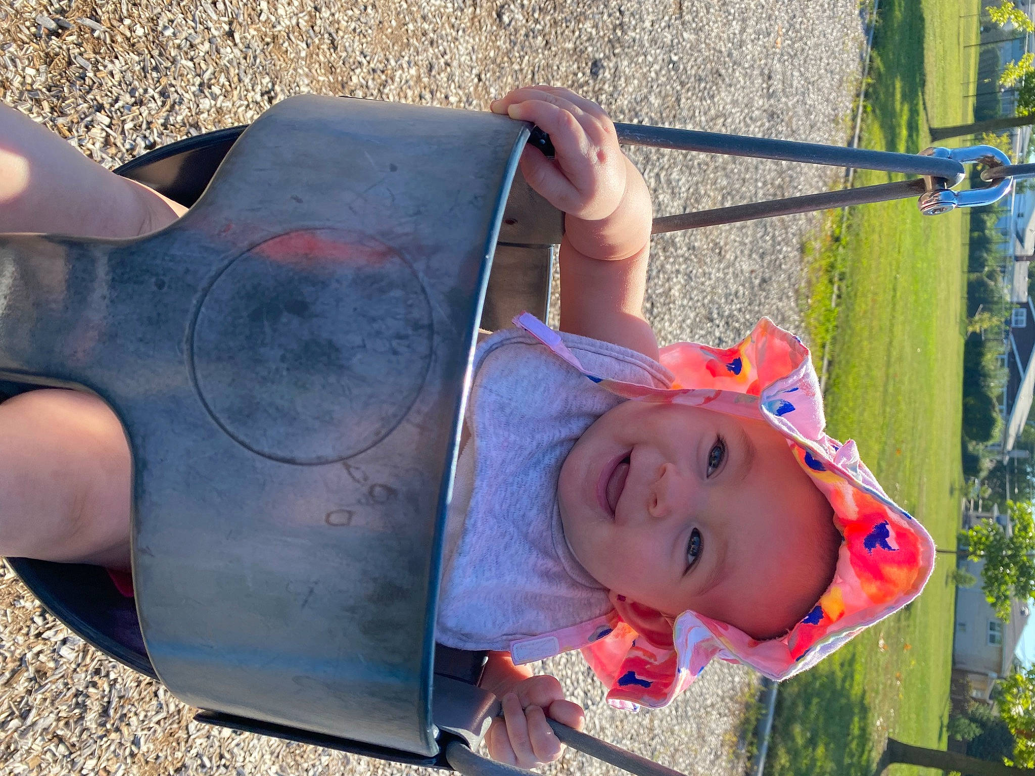 Alaiyah is registered to the contest to win money with this photo: baby, blue, electric_blue, facial_expression, foot, fun, grass, hat, headwear, leisure, musical_instrument, people, person, photograph, plant, playground, public_space, recreation, sun_hat, toddler