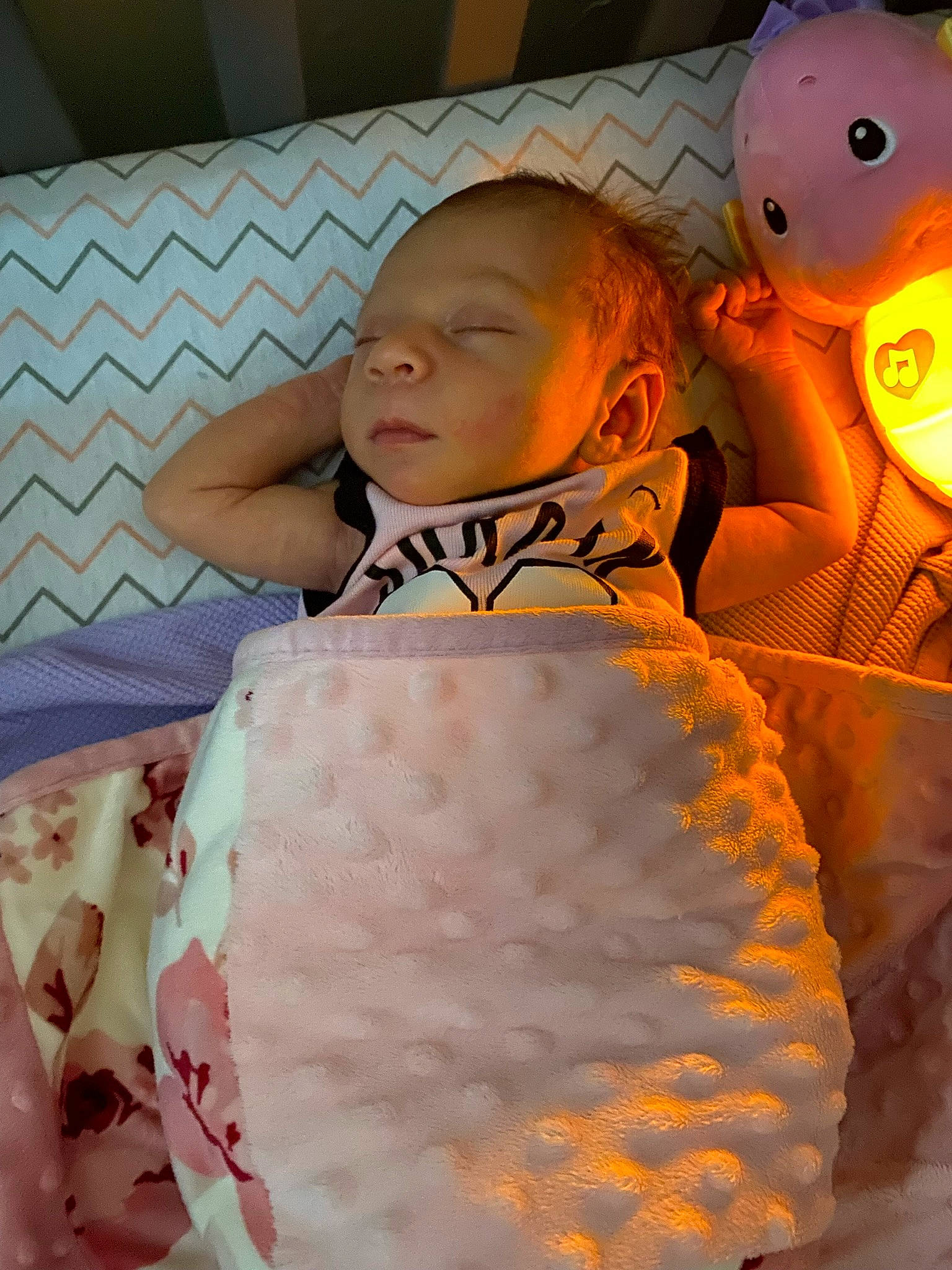 Alaiyah joined the competition — help win amazing prizes! baby, baby_sleeping, baby_toddler_clothing, bed, bed_sheet, bedding, child, comfort, fashion_design, fun, happy, linens, orange, pattern, peach, person, room, sleeve, stuffed_toy, textile