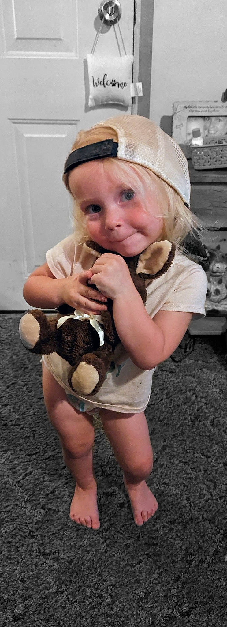 Demi is registered to the contest to win money with this photo: baby, baby_toddler_clothing, ball, cap, child, costume_hat, fashion_accessory, finger, flash_photography, fun, gesture, hand, happy, hat, headwear, joy, mammal, person, smile, sun_hat