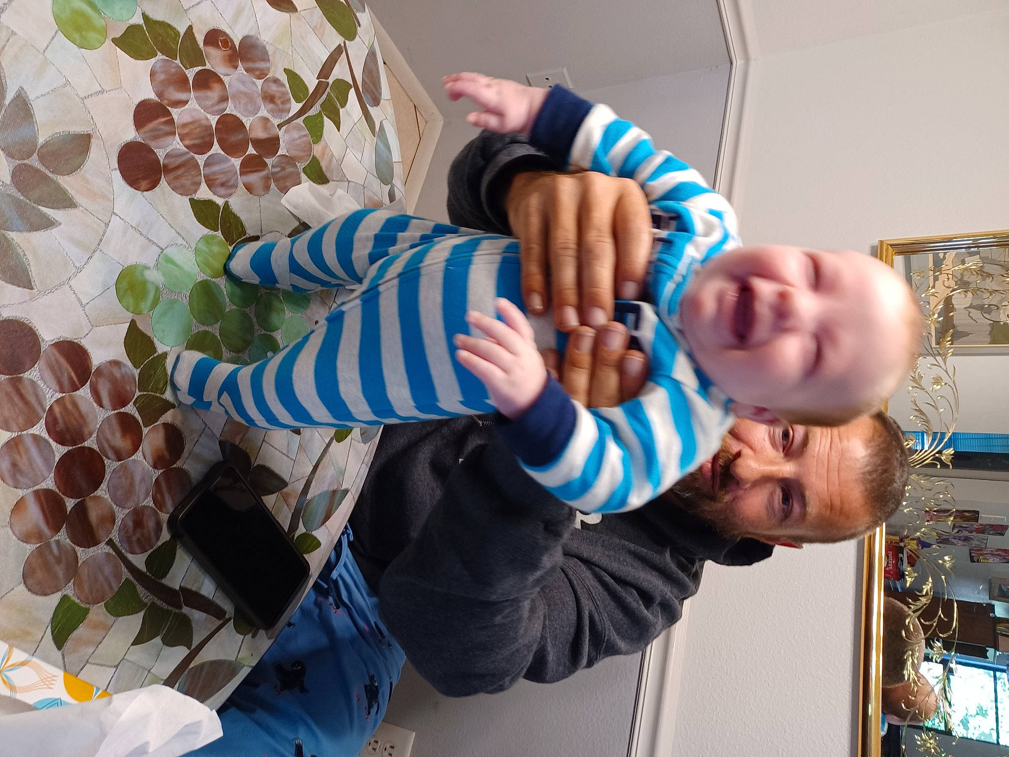 Liam joined the competition — help win amazing prizes! baby, baby_products, baby_toddler_clothing, child, comfort, finger, fun, gesture, happy, linens, nail, pattern, person, play, product, room, sitting, sleeve, smile, thumb