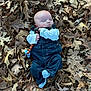 baby, sleeping, denim_overalls, pacifier, autumn_leaves, outdoor, nature, child, peaceful, fall, clothing, infant, skin, face, hand, footwear, small_person, rest, relaxation, woodland