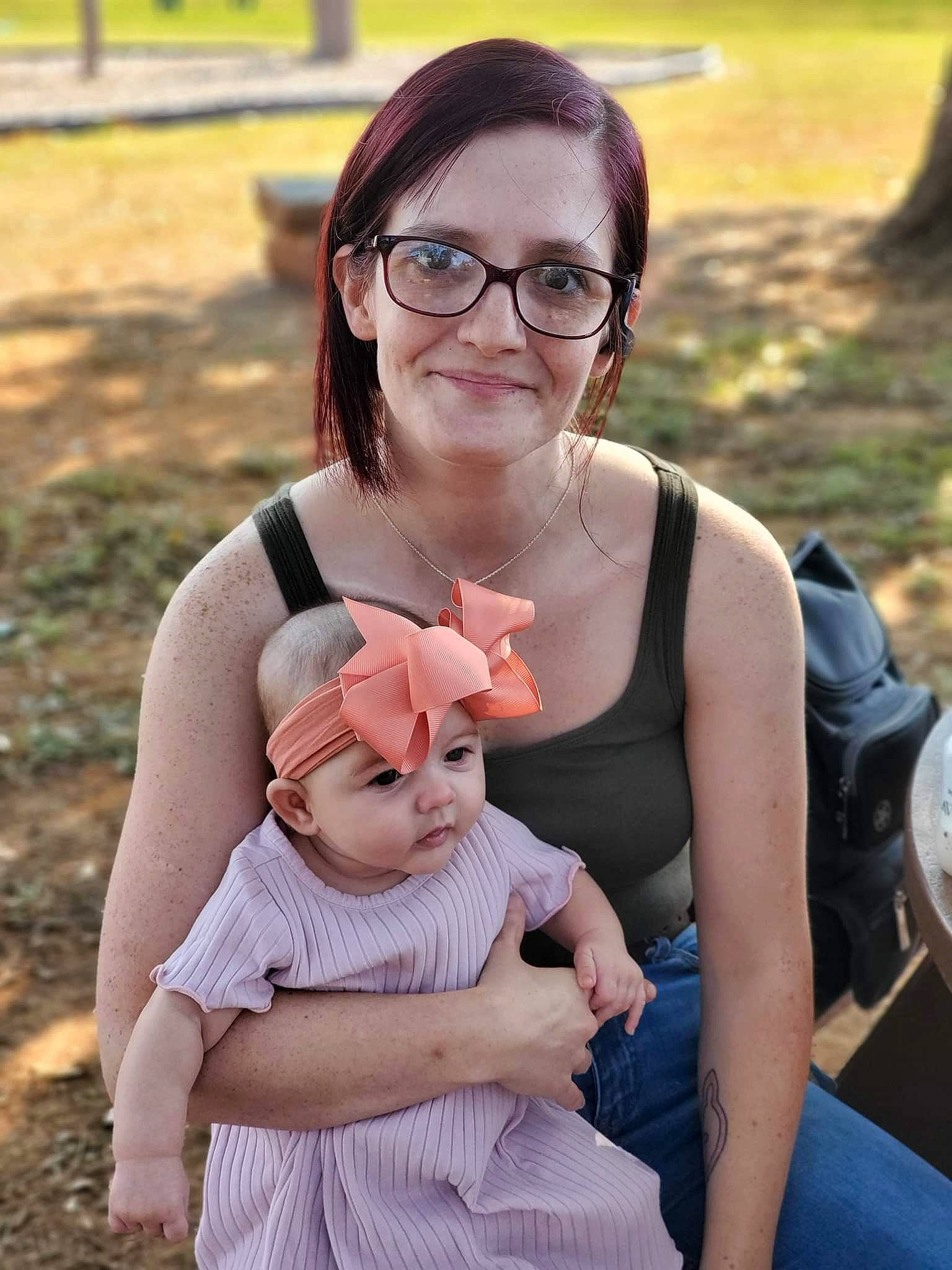 Gracelyn is registered to the contest to win money with this photo: baby, eye, eyewear, face, fawn, fun, glasses, grass, hair, happy, head, headwear, joy, leisure, necklace, person, photograph, recreation, skin, snapshot