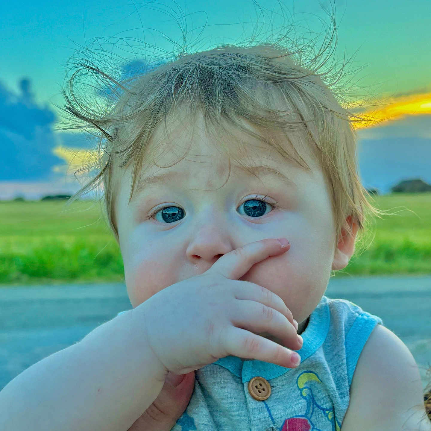 Jaxon joined the competition — help win amazing prizes! baby, blonde, bodypart, eating, face, finger, food, grass, hair, hand, happy, head, nature, outdoors, person, photography, plant, portrait, sky, smile