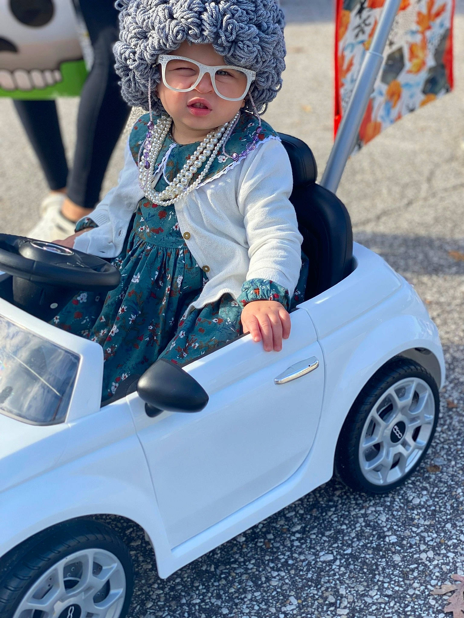 Caysen is registered to the contest to win money with this photo: alloy_wheel, automotive_design, automotive_tire, blue, car, clothing, face, fashion, headwear, hood, motor_vehicle, person, photograph, rim, street_fashion, sunglasses, tire, vehicle, vehicle_door, wheel