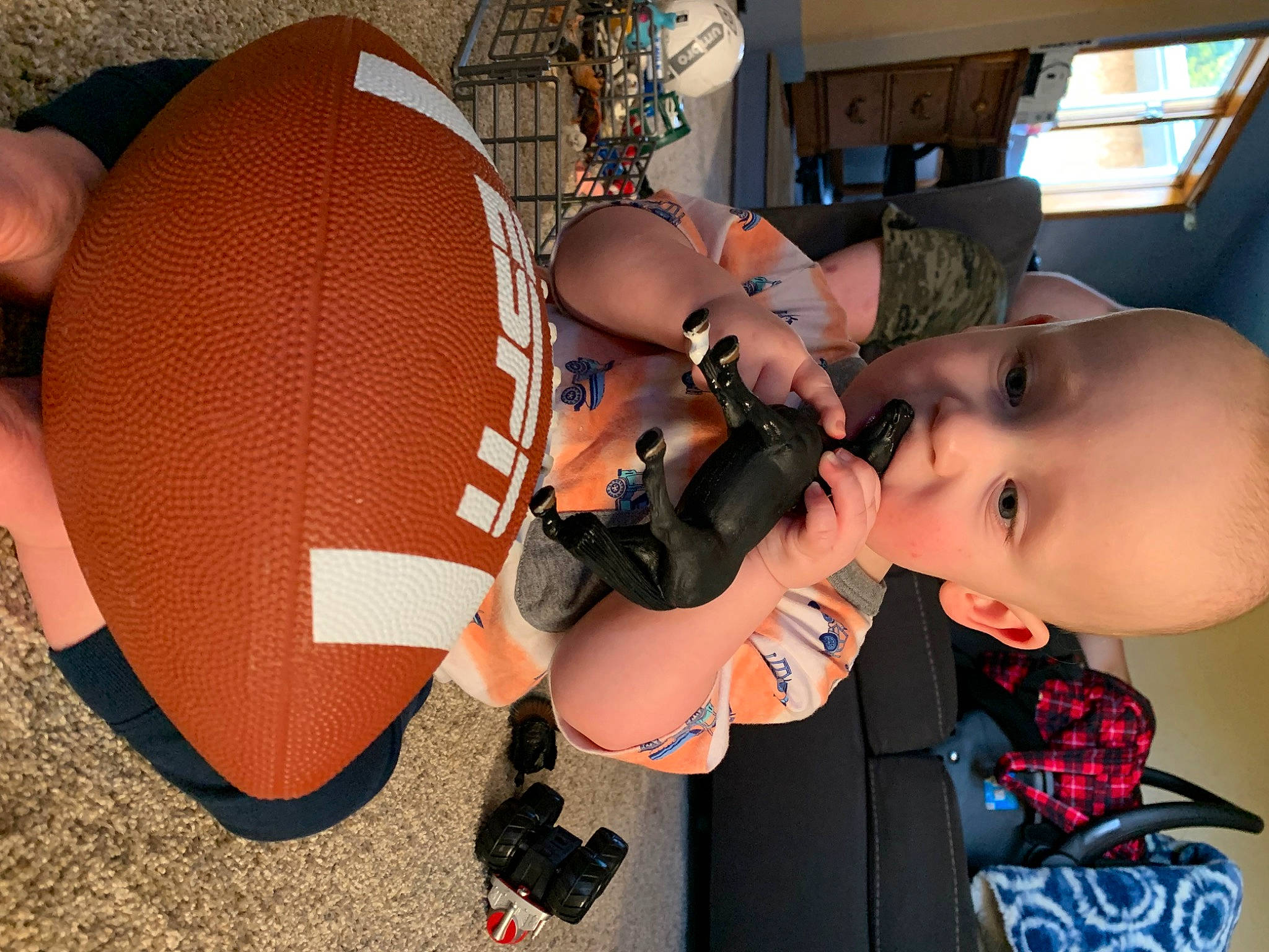 Eli joined the competition — help win amazing prizes! audio_equipment, baby, cap, cool, drum, eyewear, finger, fun, hat, headgear, human_body, mouth, musical_instrument, person, personal_protective_equipment, plant, sports_gear, sun_hat, sunglasses, thigh