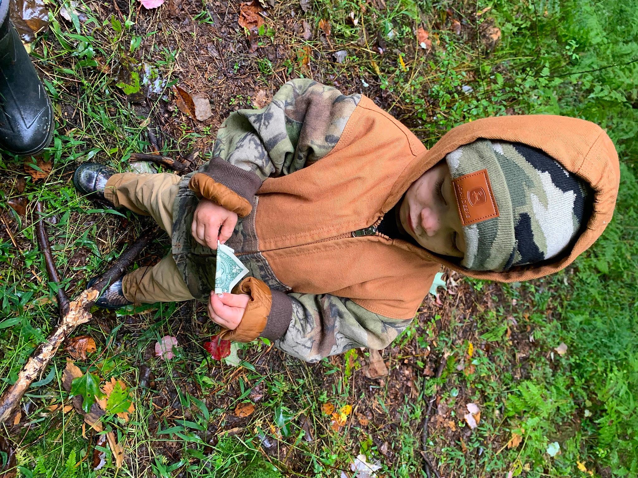 Waylon joined the competition — help win amazing prizes! adaptation, fun, grass, grass_family, groundcover, hat, headwear, landscape, lawn, leisure, military_camouflage, people_in_nature, person, plant, shoe, shrub, sneakers, soil, sunglasses, toddler