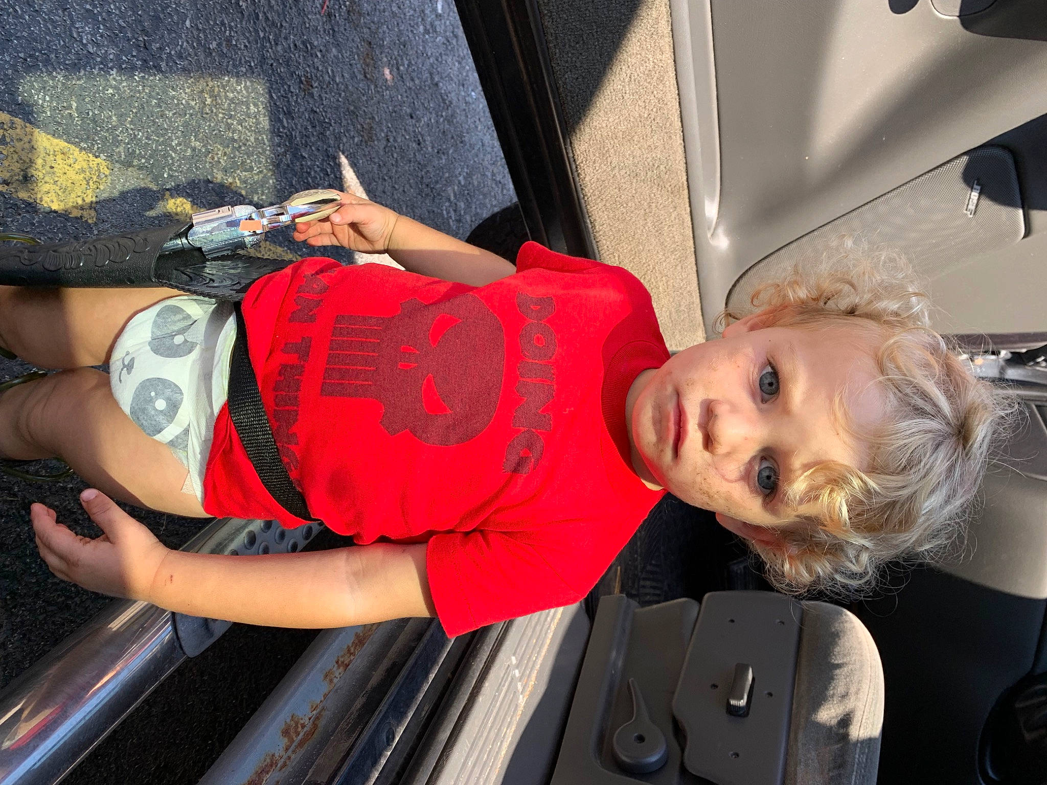 Waylon is registered to the contest to win money with this photo: auto_part, automotive_design, automotive_exterior, automotive_lighting, automotive_window_part, bumper, child, elbow, electric_blue, family_car, fun, human_leg, luxury_vehicle, motor_vehicle, person, sorrow, toddler, transport, travel, vacation