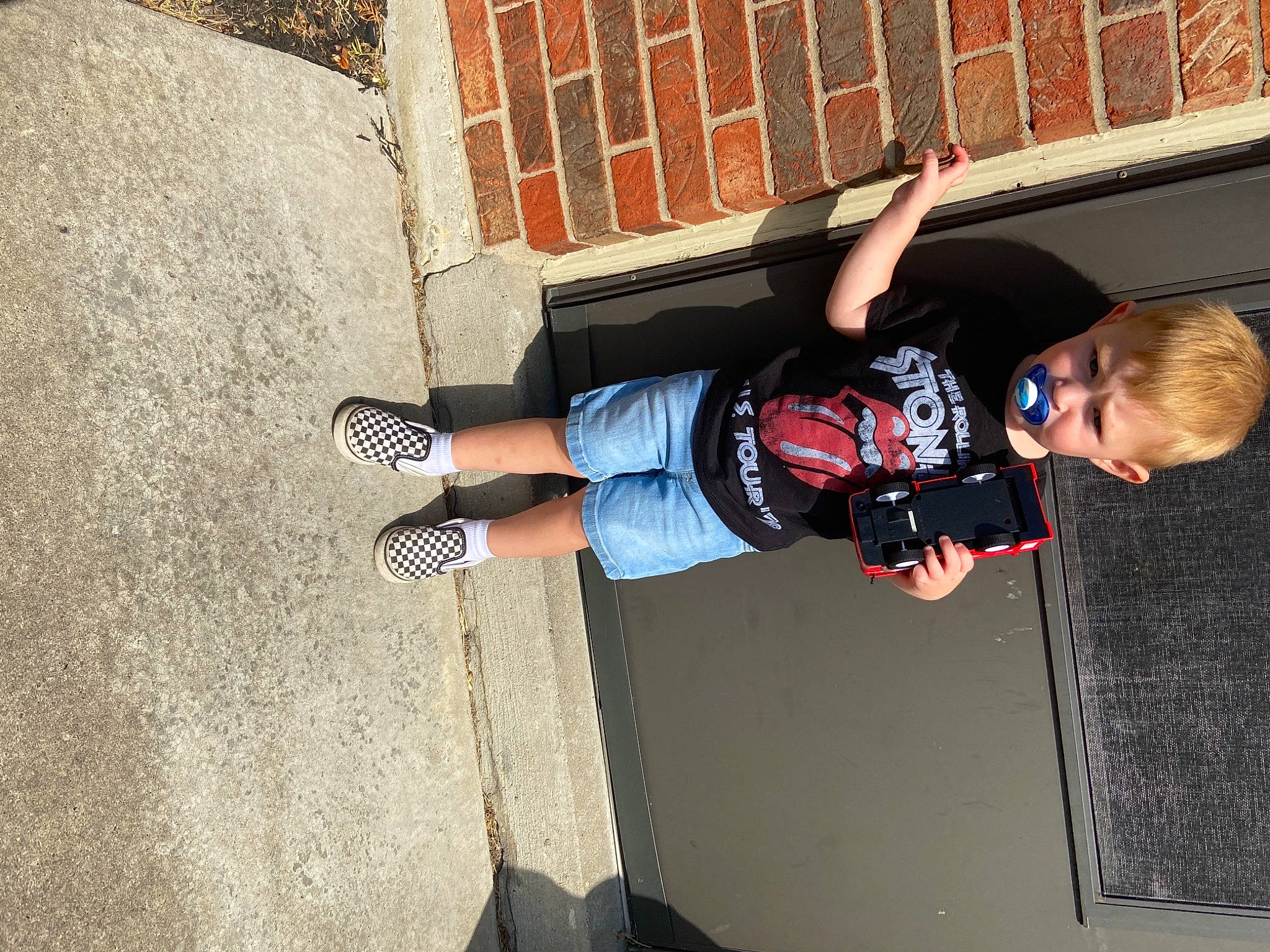 Konner joined the competition — help win amazing prizes! asphalt, carmine, concrete, denim, elbow, electric_blue, fun, human_leg, knee, outdoor_shoe, person, recreation, shorts, sneakers, sportswear, street_fashion, t_shirt, thigh, toddler, walking_shoe