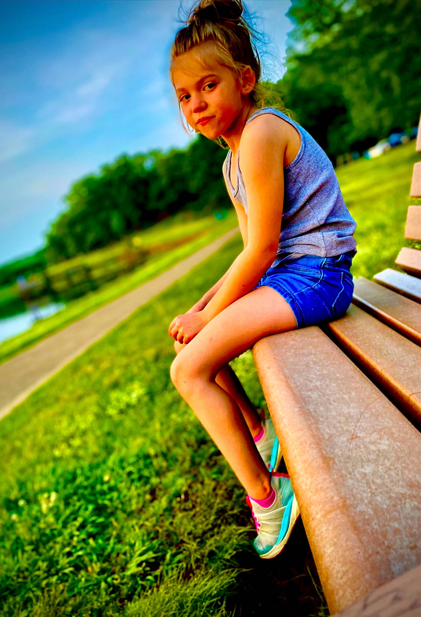 Ryleigh is registered to the contest to win money with this photo: flash_photography, footwear, grass, green, hair, happy, knee, leisure, morning, people_in_nature, person, plant, shoe, shoulder, sky, smile, sneakers, sunlight, thigh, tree