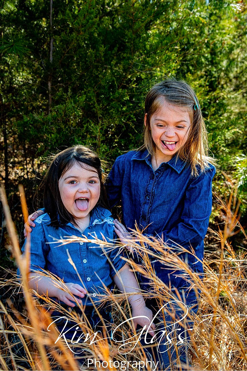 Ryleigh is registered to the contest to win money with this photo: electric_blue, forest, fun, grass, grass_family, grassland, happy, leaf, leisure, long_hair, meadow, natural_landscape, people_in_nature, person, plant, prairie, recreation, smile, tree, wood