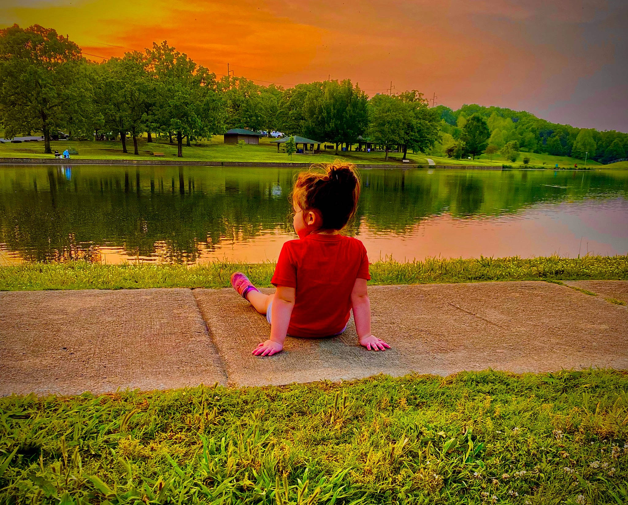 Mckenzie is registered to the contest to win money with this photo: bank, botany, cloud, grass, grassland, happy, lake, leisure, light, morning, natural_landscape, nature, people_in_nature, person, plant, sky, sunlight, sunset, tree, water