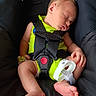 Mateo is registered to the contest to win money with this photo: baby, infant, sleeping, car_seat, harness, bright_clothing, hospital_wristband, foot, hand, skin, newborn, child, seat, safety, resting, cute, indoors, portrait, peaceful, closeup