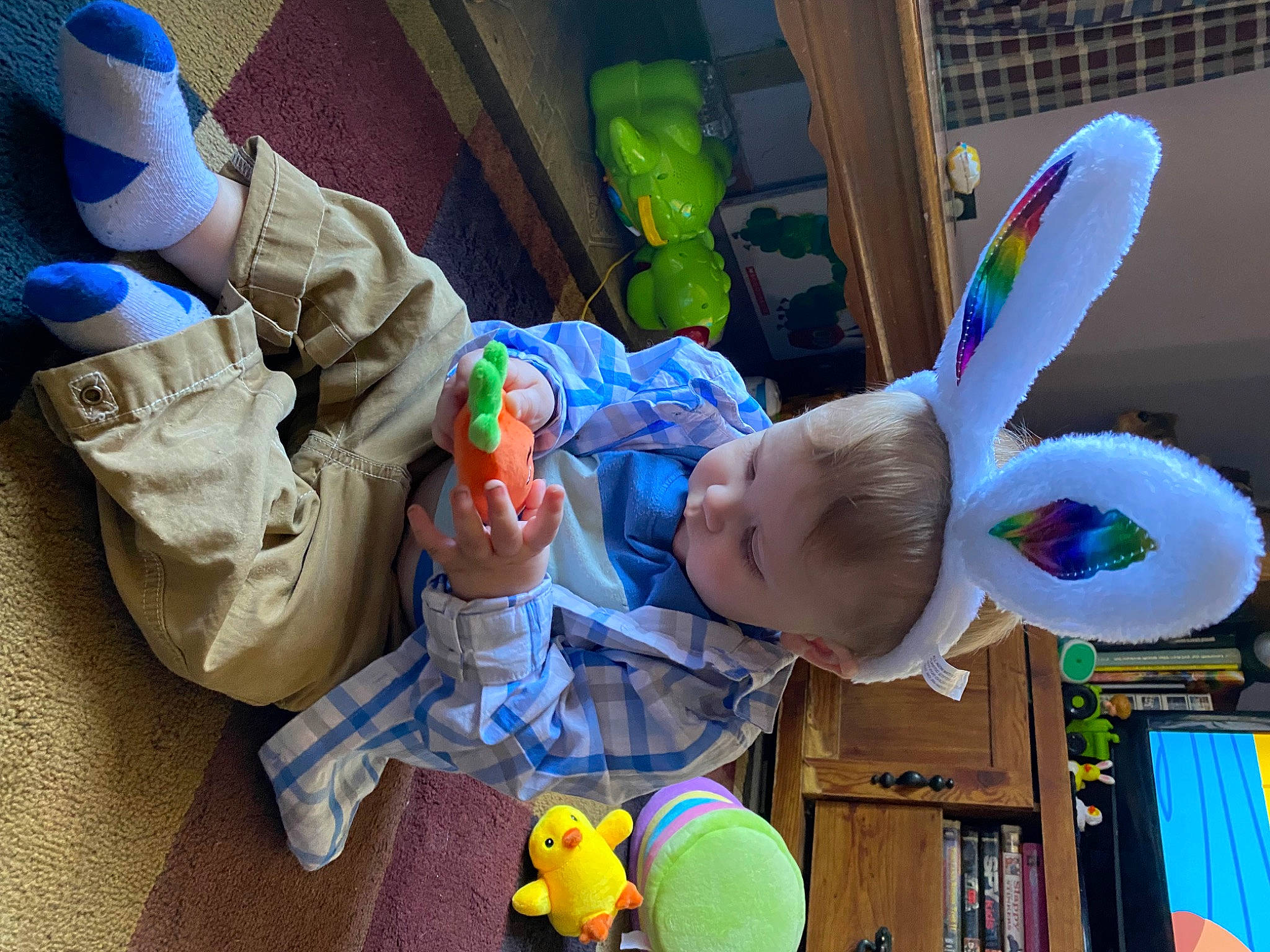 Jaxson is registered to the contest to win money with this photo: baby, baby_products, baby_toddler_clothing, baby_toys, blue, child, event, fun, green, leisure, party_supply, person, plastic, play, product, room, snapshot, stuffed_toy, toddler, toy