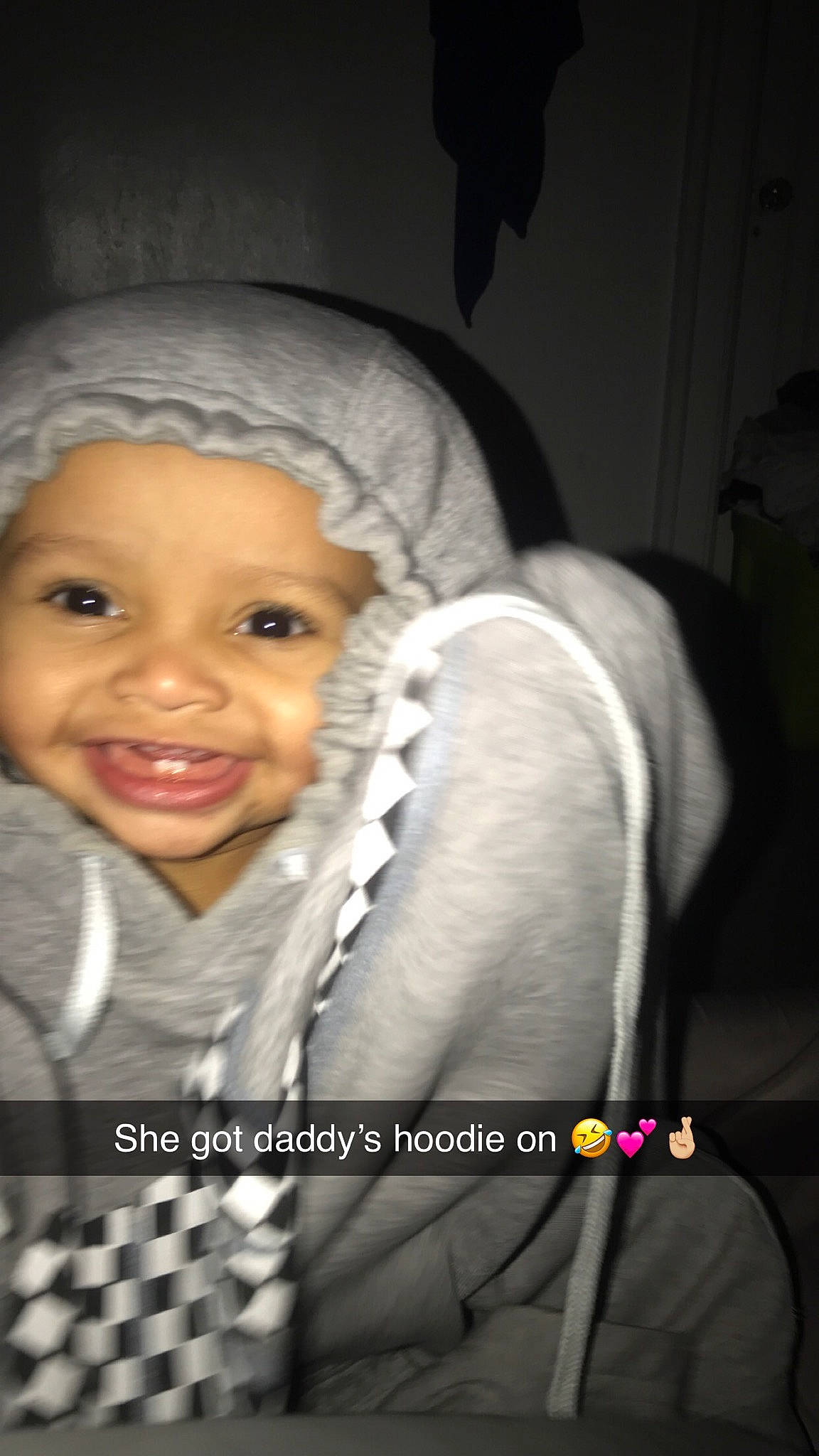 Amelie is registered to the contest to win money with this photo: baby, cheek, child, eyebrow, face, fashion_accessory, flash_photography, font, fun, fur, happy, headwear, joy, laugh, mouth, nose, person, photo_caption, portrait, portrait_photography