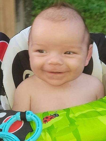 Hudson is registered to the contest to win money with this photo: baby, baby_products, baby_toddler_clothing, beauty, cheek, child, chin, eye, eyebrow, fun, grass, green, happy, iris, joy, leisure, mouth, nose, person, skin