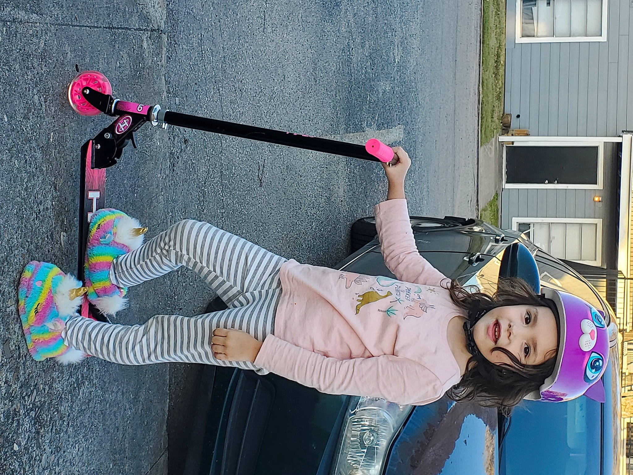 Delilah joined the competition — help win amazing prizes! child, concrete, costume, fun, happy, hat, headwear, human_leg, knee, person, photograph, pink, recreation, sandal, smile, sneakers, thigh, tire, toddler, tree