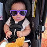 baby, child, close_up, funny, harness, indoor, infant, plush_toy, portrait, purple_sunglasses, safe, seatbelt, shorts, sitting, stroller, stuffed_animal, sunglasses, tile_floor, tongue_out, white_shirt