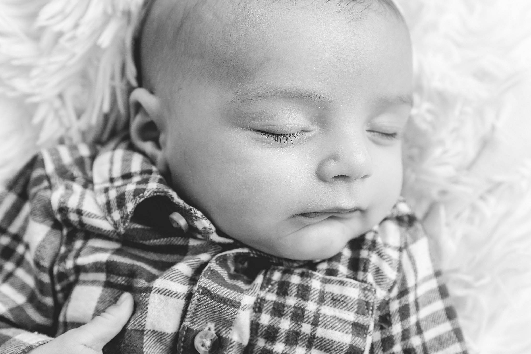 Elliot is registered to the contest to win money with this photo: baby_toddler_clothing, black, black_and_white, cheek, collar, eyelash, facial_expression, flash_photography, happy, iris, nose, person, photograph, plaid, skin, sleeve, style, tartan, textile, toddler