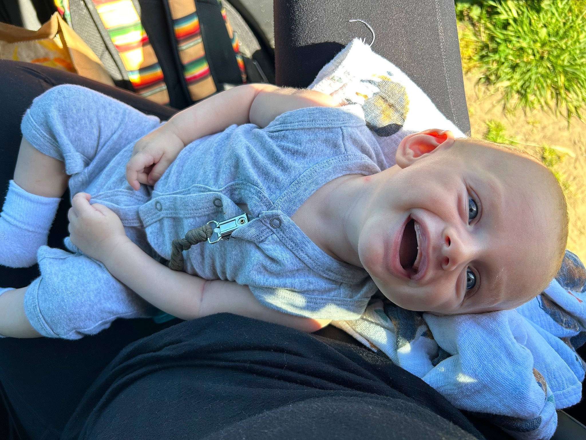 David joined the competition — help win amazing prizes! baby, baby_products, baby_toddler_clothing, child, comfort, fun, grass, happy, human_leg, lap, leisure, person, plant, sitting, smile, thigh, toddler, tree, vacation