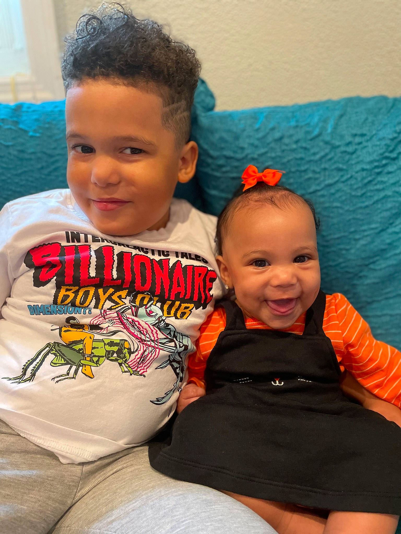 Soraya is registered to the contest to win money with this photo: baby_toddler_clothing, child, chin, cool, eye, facial_expression, forehead, fun, hair, hairstyle, happy, head, joy, neck, nose, orange, person, red, skin, smile