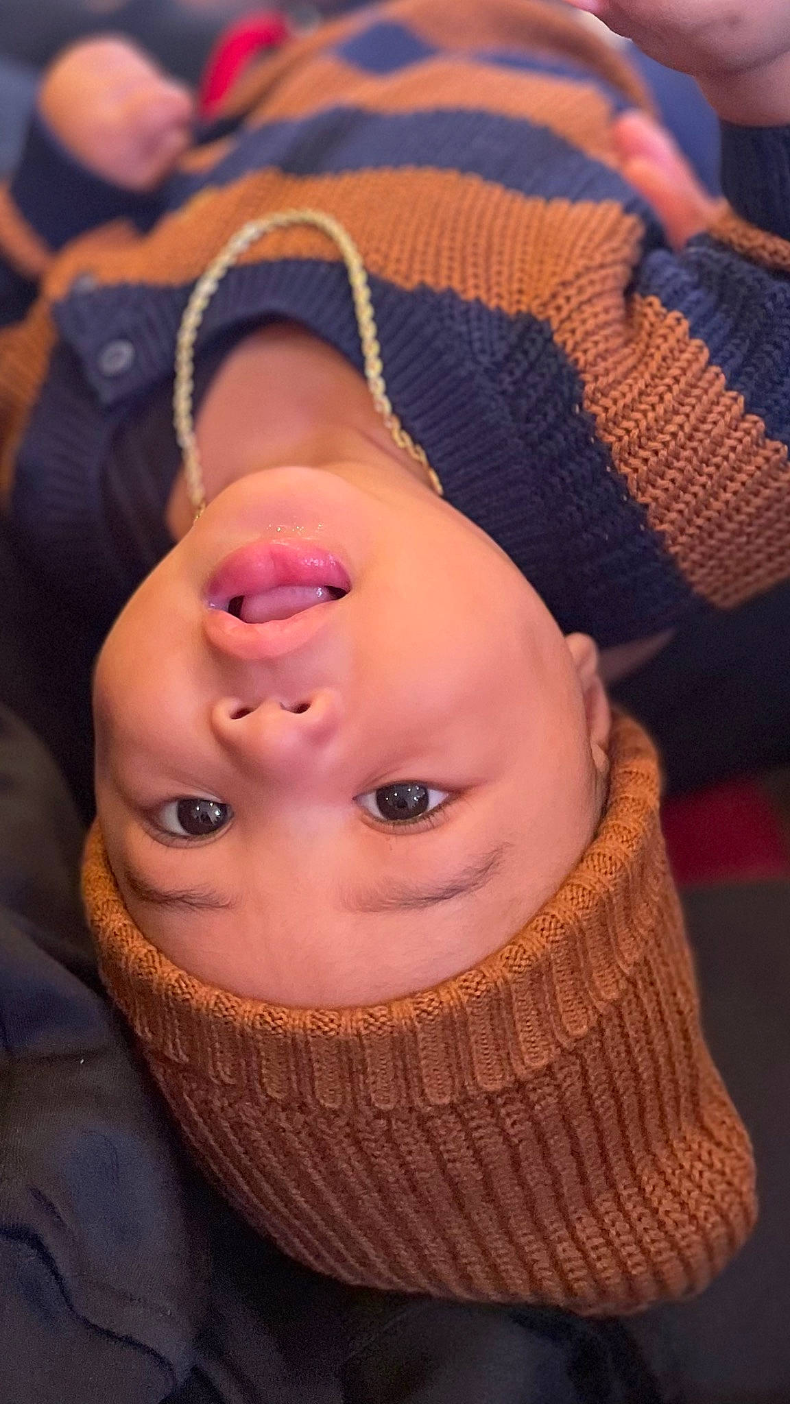 Cairo is registered to the contest to win money with this photo: baby, baby_toddler_clothing, cheek, child, comfort, cool, eyelash, fashion_accessory, fun, happy, headwear, knit_cap, lip, mouth, nose, pattern, person, skin, textile, toddler