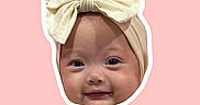 Khloe joined the competition — help win amazing prizes! baby, face, headband, bow, smile, cute, infant, portrait, child, pink_background, headwear, closeup, adorable, happy, skin, eyes, person, baby_face, expression, isolated