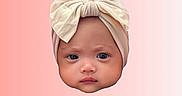 Khloe is registered to the contest to win money with this photo: adorable, baby, bow, child, closeup, cute, expression, eyes, face, floating_head, headband, headwear, infant, isolated, lips, pink_background, portrait, skin, soft_colors, studio_style