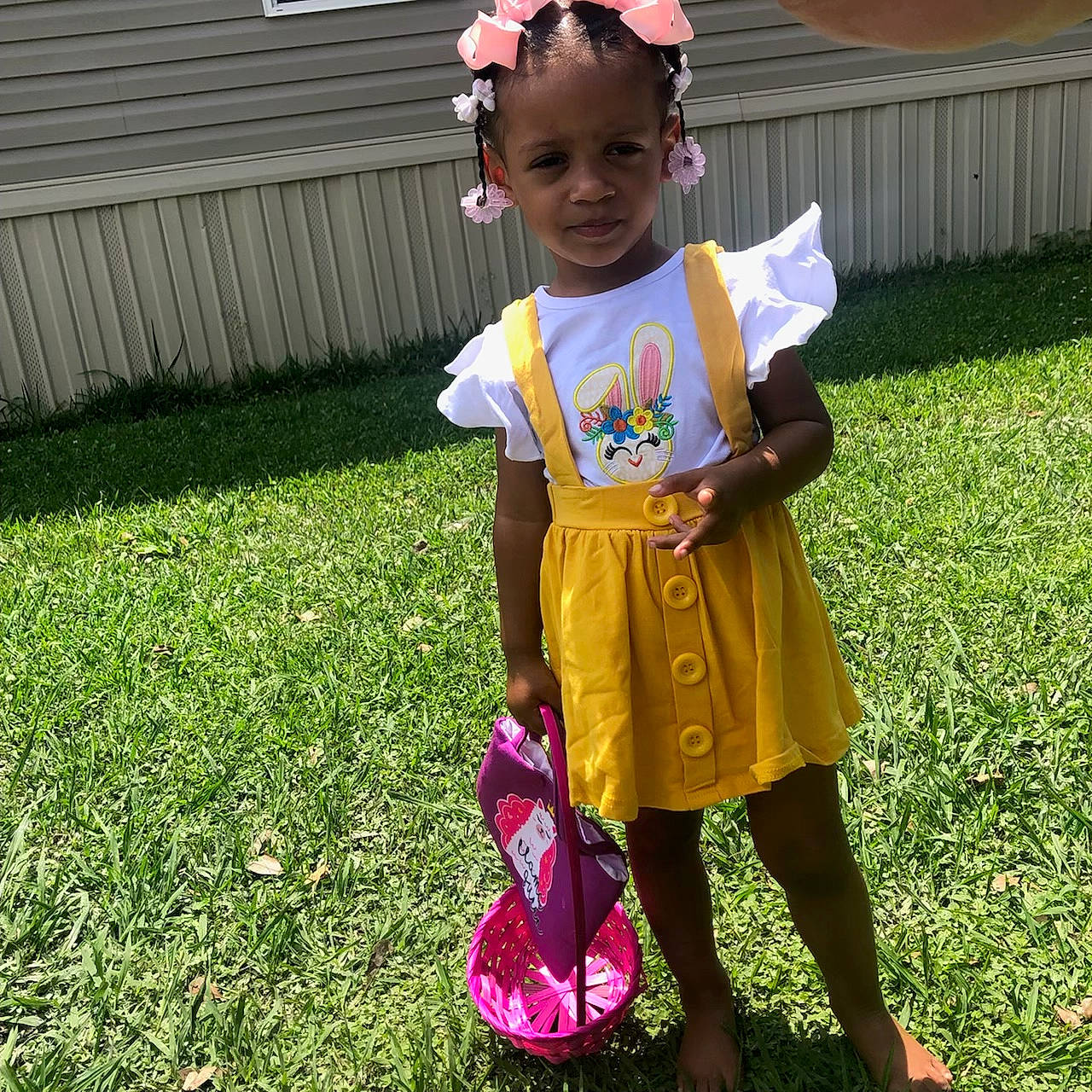 Khyliah joined the competition — help win amazing prizes! baby_toddler_clothing, child, costume, fun, garden, grass, grassland, happy, hat, lawn, magenta, pajamas, pattern, people_in_nature, person, petal, pink, sandal, sleeve, smile