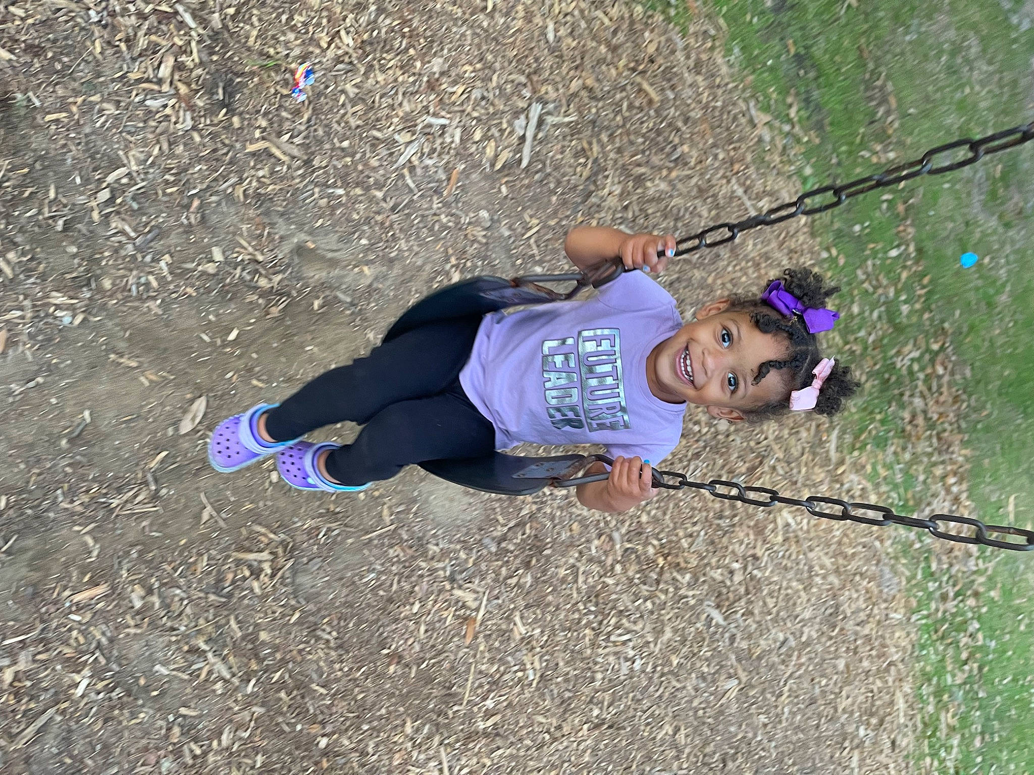 Khyliah is registered to the contest to win money with this photo: adventure, child, electric_blue, fun, grass, helmet, joy, landscape, leg, leisure, outdoor_recreation, people_in_nature, person, play, recreation, rope, sneakers, soil, sport_climbing, sports
