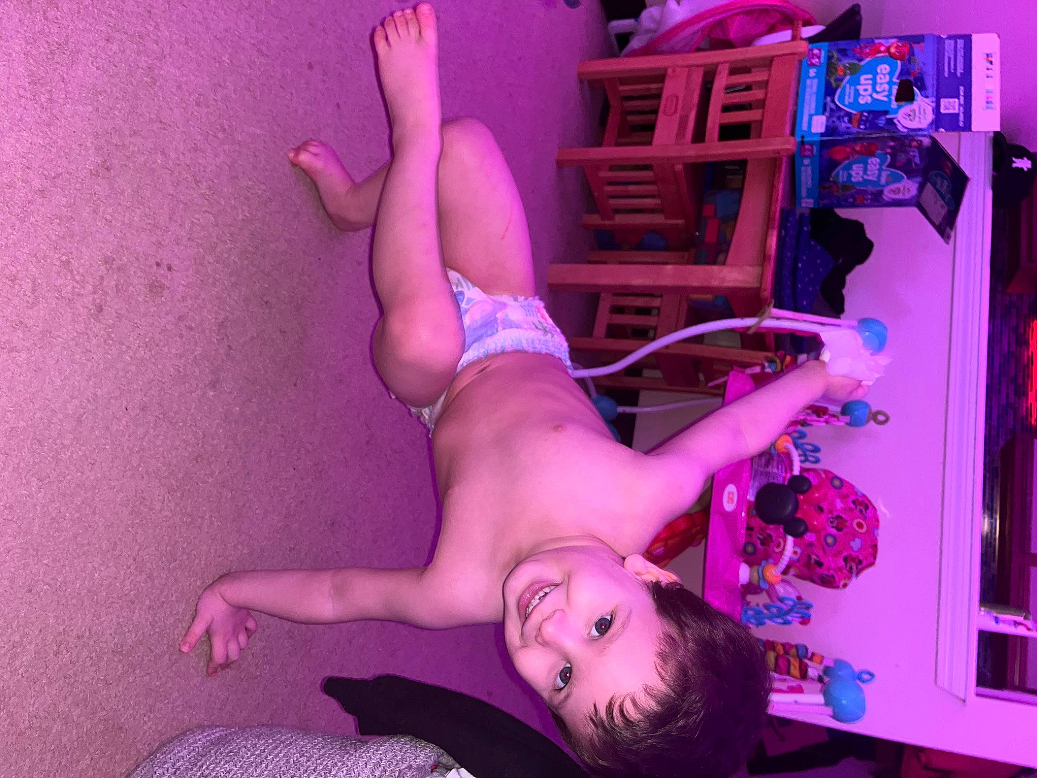 Cole is registered to the contest to win money with this photo: abdomen, arm, chest, elbow, entertainment, event, flash_photography, fun, human_leg, joint, joy, leg, magenta, muscle, performance, performing_arts, person, pink, purple, smile