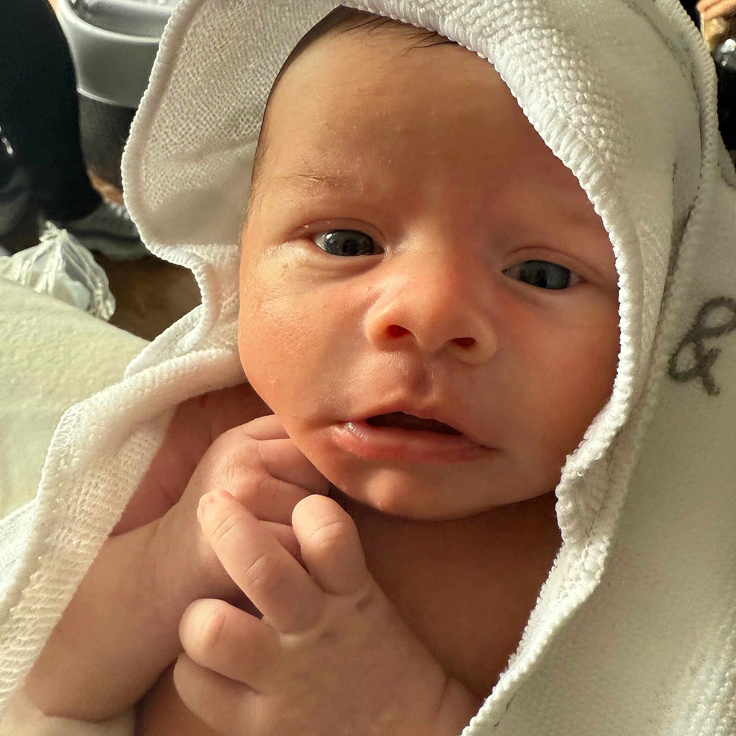 Alijah is registered to the contest to win money with this photo: baby, child, close_up, cozy, cute, expression, face, fresh, hand, human, indoors, infant, newborn, newborn_baby, portrait, skin, soft, towel, warm, wrapped