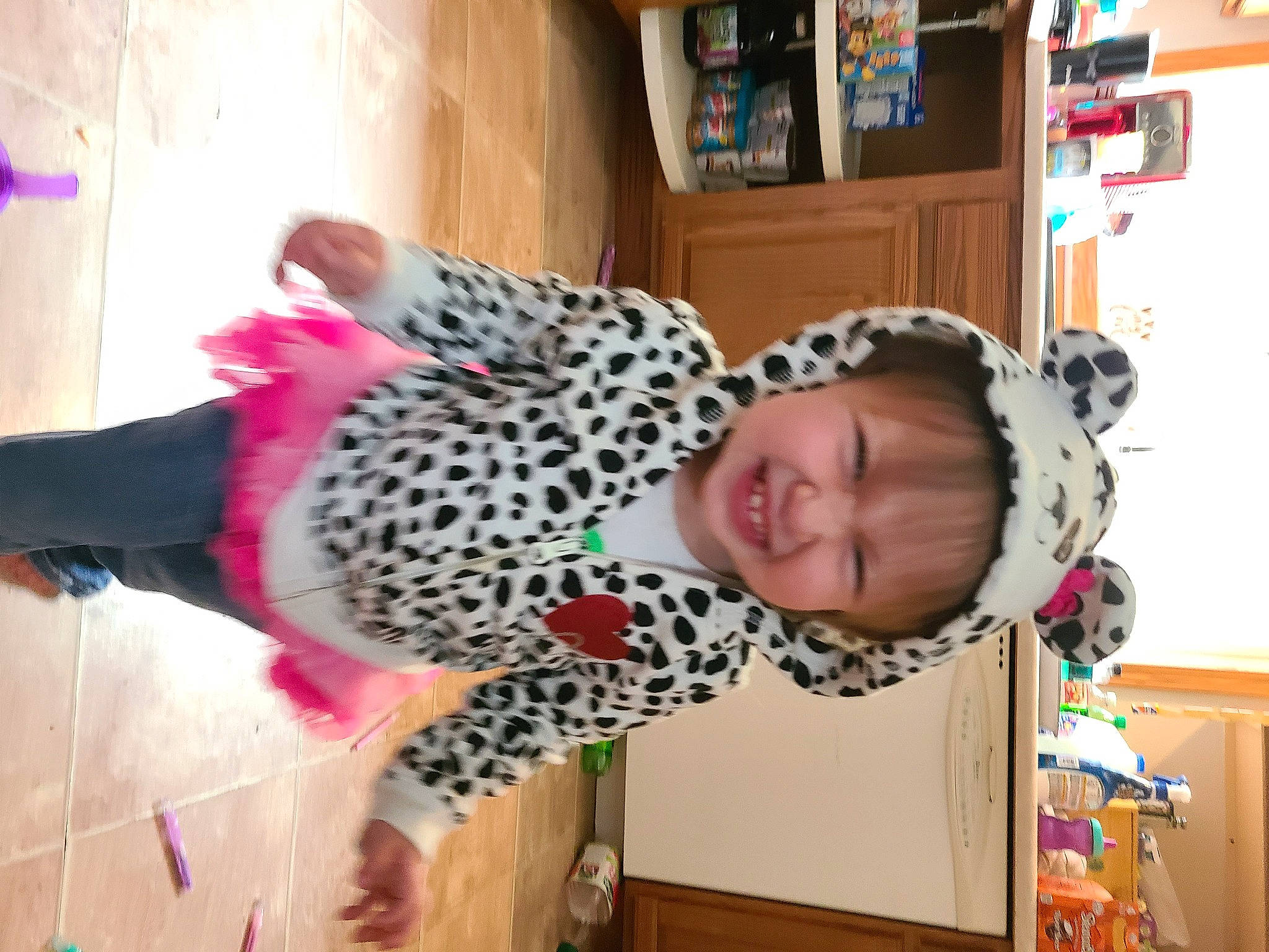 Addisyn is registered to the contest to win money with this photo: baby, child, fun, fur, happy, headwear, magenta, pattern, person, play, room, shelf, shelving, smile, toddler, tree, visual_arts, wood