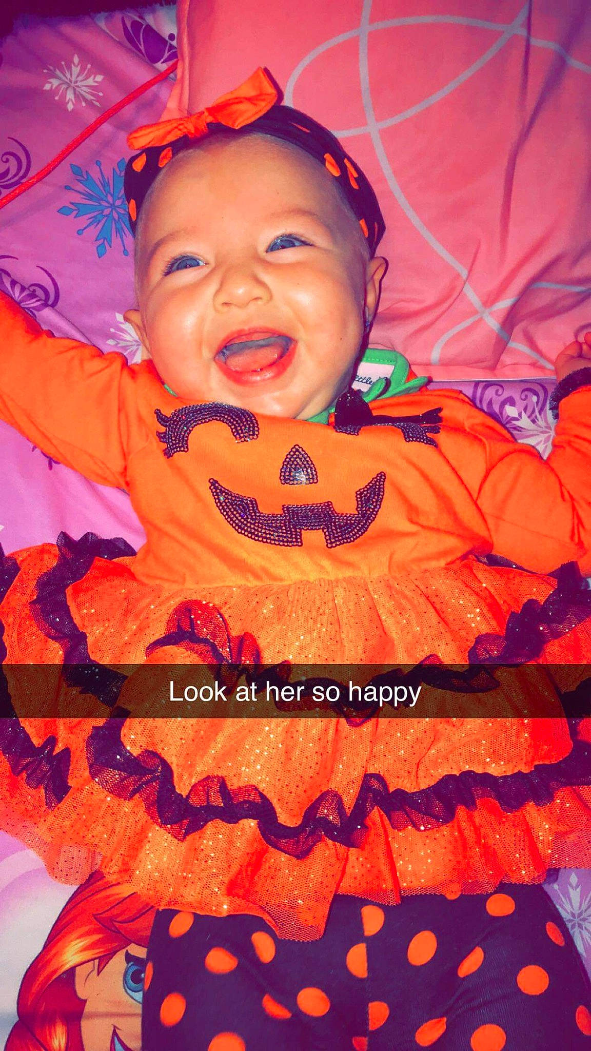 Addisyn is registered to the contest to win money with this photo: baby, baby_products, baby_toddler_clothing, child, costume, entertainment, event, fun, happy, laugh, mouth, orange, organ, party, peach, person, photo_caption, pink, smile, sweetness
