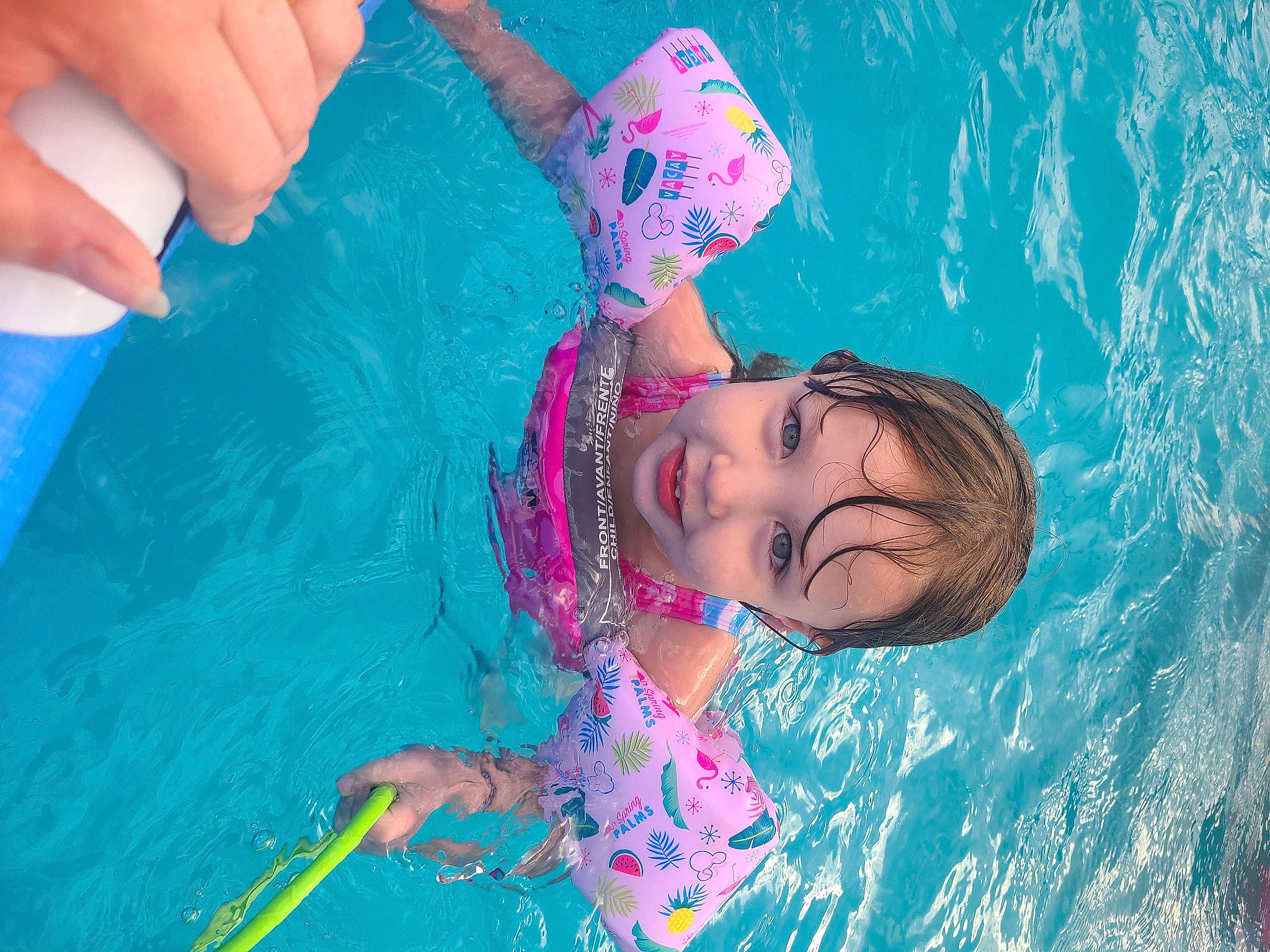 Addisyn is registered to the contest to win money with this photo: aqua, azure, bathing, child, electric_blue, flash_photography, fun, happy, leisure, magenta, nail, people_in_nature, person, pink, play, recreation, smile, summer, swimming_pool, thumb
