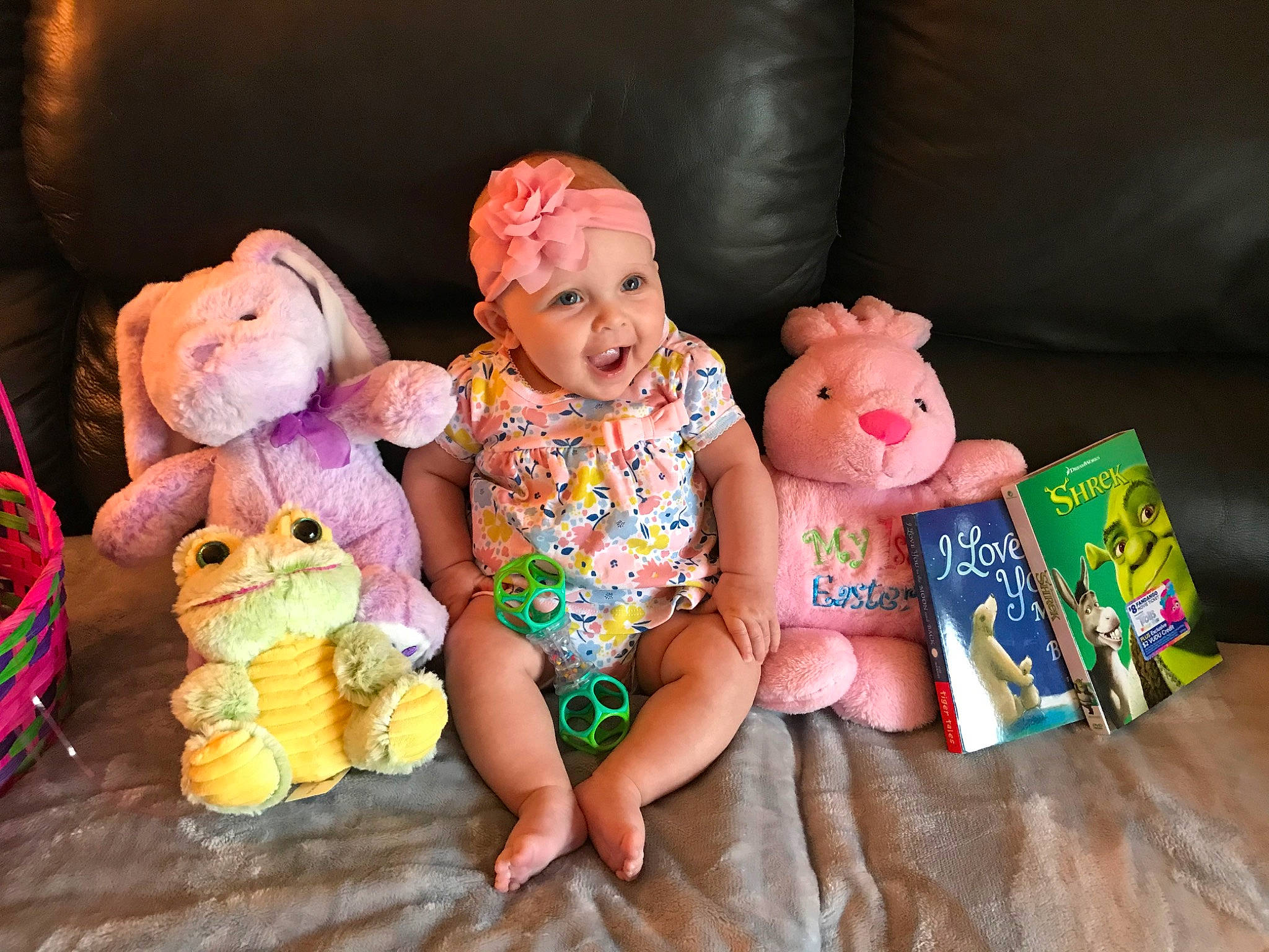 Haley is registered to the contest to win money with this photo: baby, baby_toys, child, diaper, doll, headwear, person, pink, play, plush, room, sitting, stuffed_toy, teddy_bear, toddler, toy