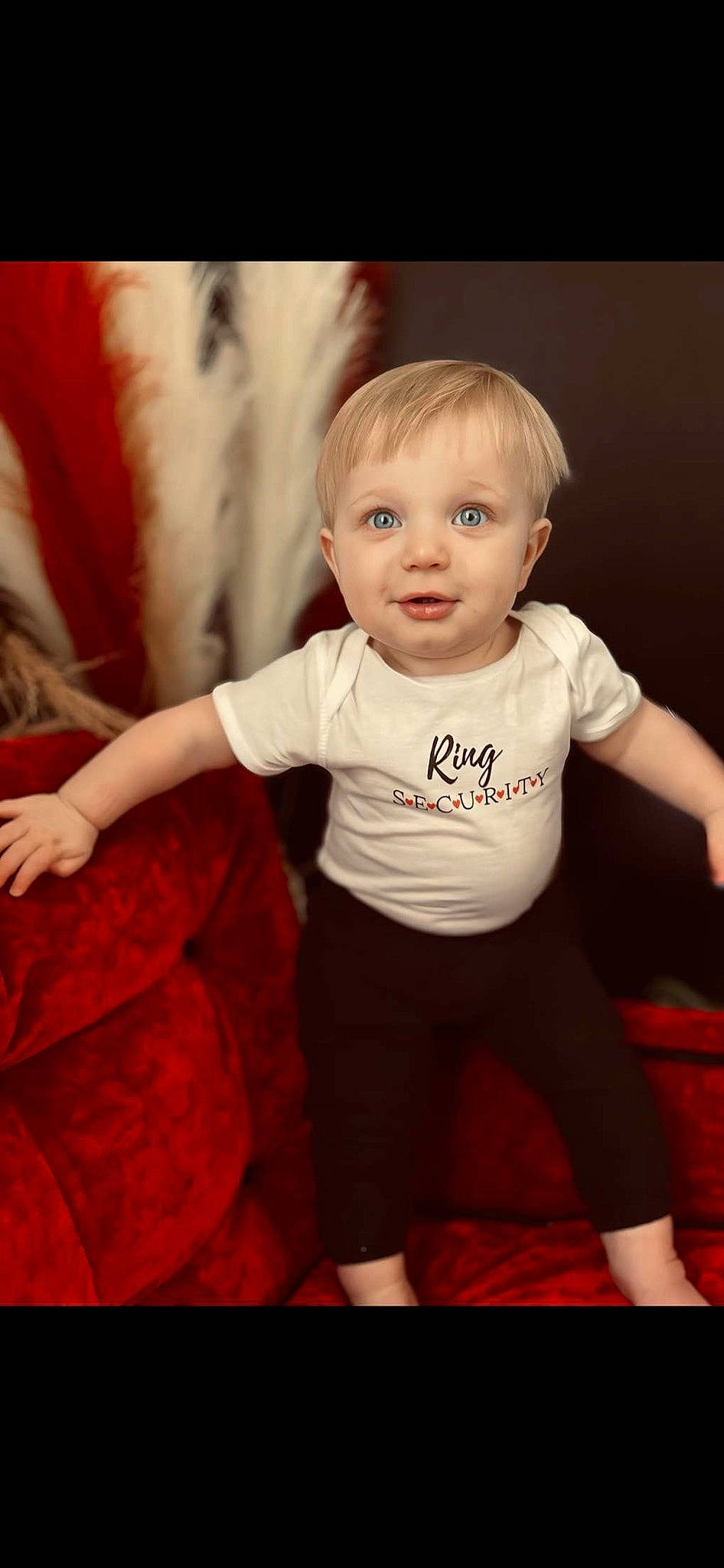 Myles is registered to the contest to win money with this photo: baby, baby_toddler_clothing, cheek, child, comfort, elbow, flash_photography, fun, gesture, happy, head, human_leg, knee, person, sitting, sleeve, sportswear, t_shirt, thigh, toddler
