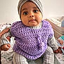 Malya a rejoint le concours — aidez-le/la à gagner de superbes lots ! baby, beanie, bonnet, cap, clothing, couch, face, furniture, hat, head, hosiery, knitwear, newborn, pants, person, photography, portrait, sitting, sock, sweater
