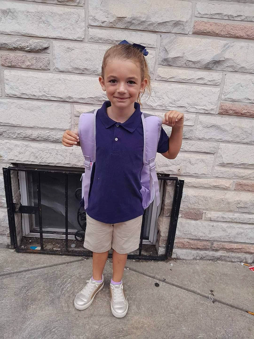 Adriana joined the competition — help win amazing prizes! brick, electric_blue, face, fun, happy, joint, joy, leisure, magenta, person, purple, shorts, sitting, sleeve, smile, standing, t_shirt, toddler, travel, vacation